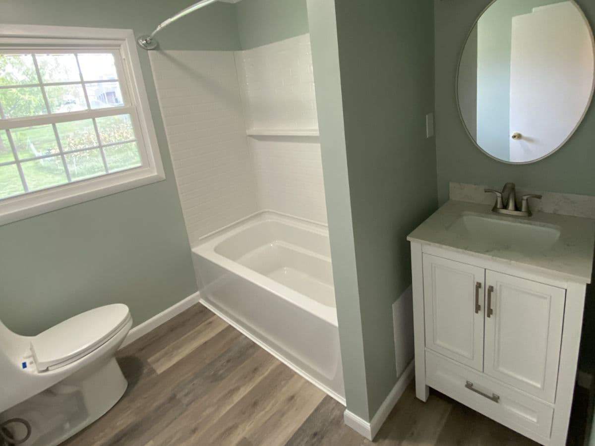 Bathroom remodel project in Bristol, TN - modern vanity and tile work by V&C Remodeling